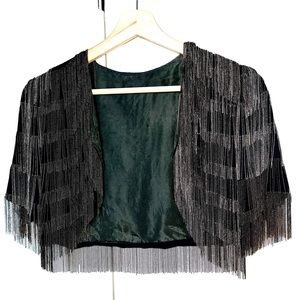 Lavish throw over, with metal beads dripping all over. Army green lining.